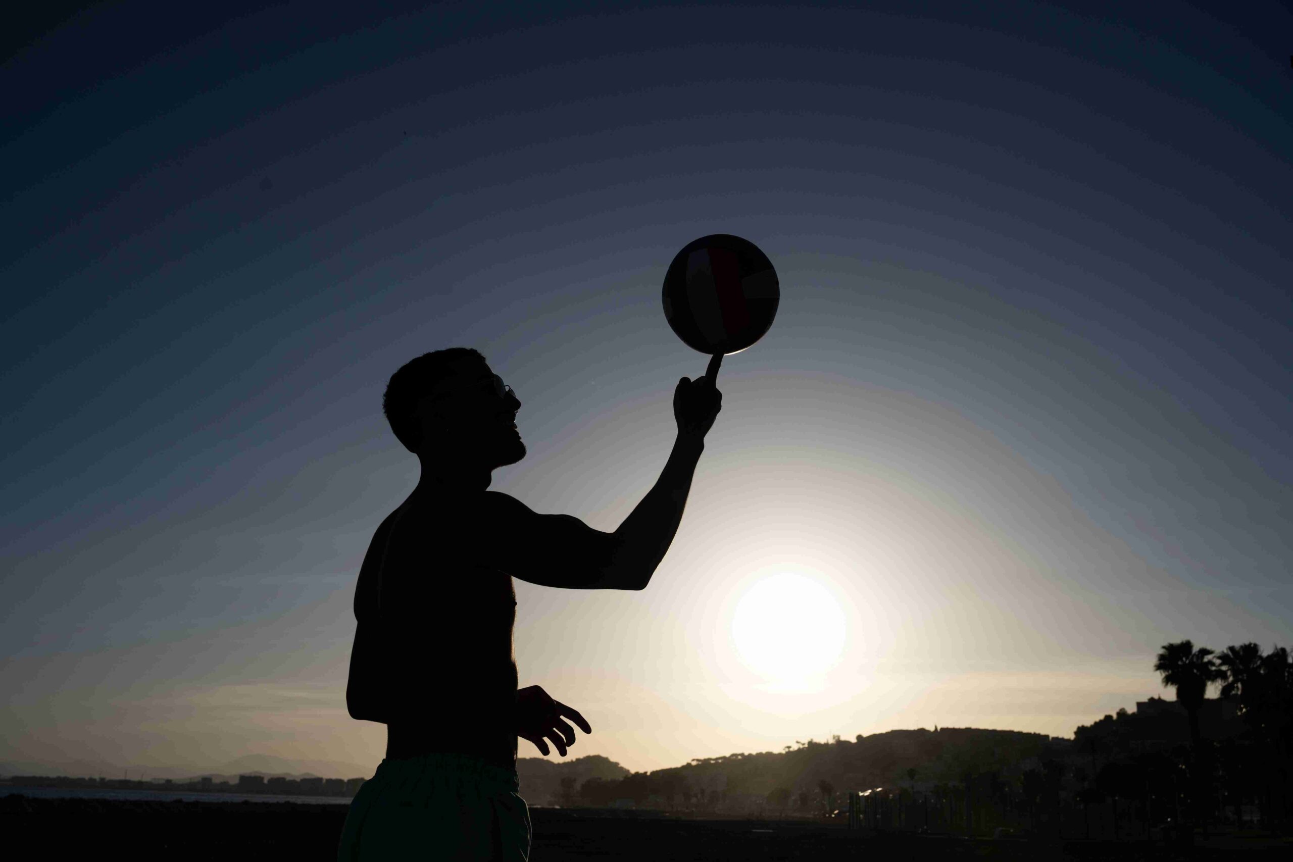 side-view-man-doing-tricks-with-ball_11zon