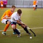 field-hockey-players-tournament-game_11zon