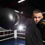 front-view-boxer-practicing-protective-gloves_11zon